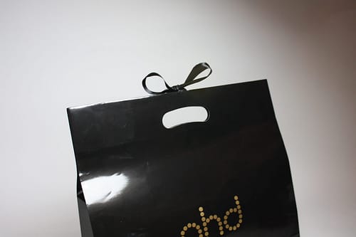 Die cut bag with ribbon attached